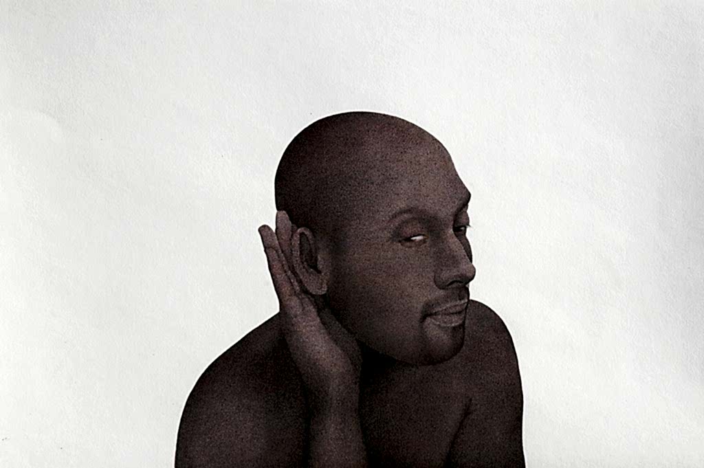 Watercolour pigments on wasli paper: a masculine black figure, with a small beard, turns his ear to the viewer and cups his hand around his ear in a gesture of listening